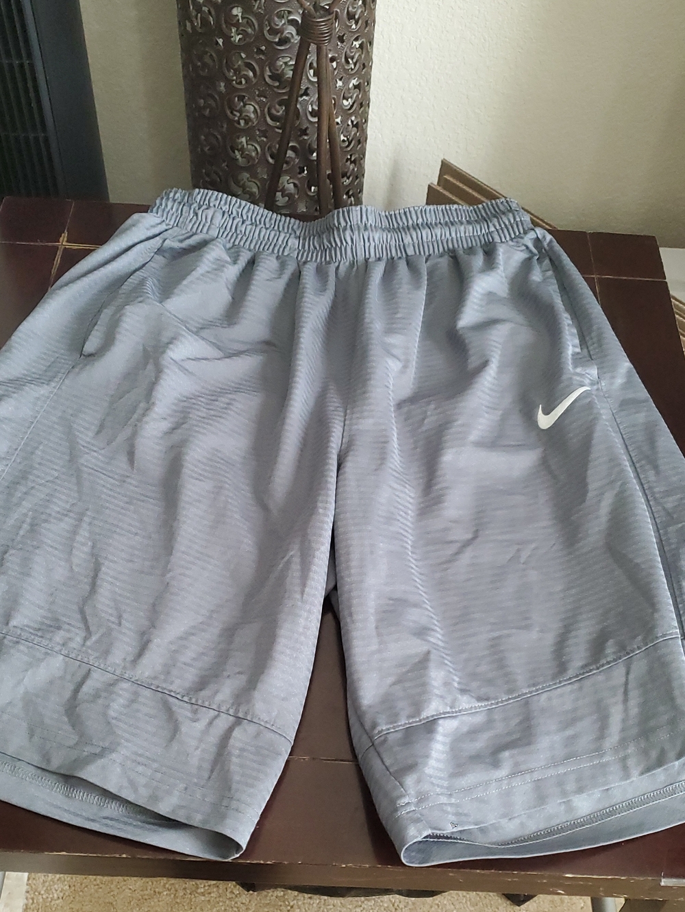 Nike Light Gray Athletic Shorts with White Swoosh